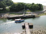 SX28983 Boat passing bridge in river Afon Seiont.jpg